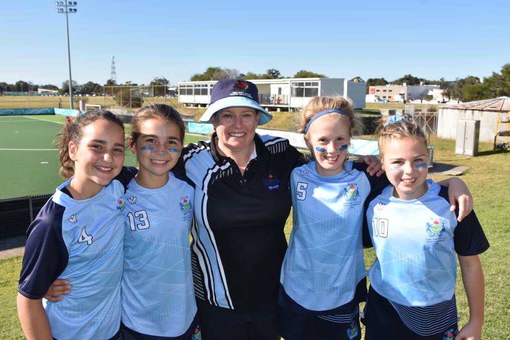 WINNERS: Lucy Wilson, Lily Crockett, Thea O'Sullivan, Matilda Woolnough and Sienna Harvey. All five were part of NSW's title win at the School Sport Australia Hockey Championships at Newcastle International Hockey Complex last week. 
