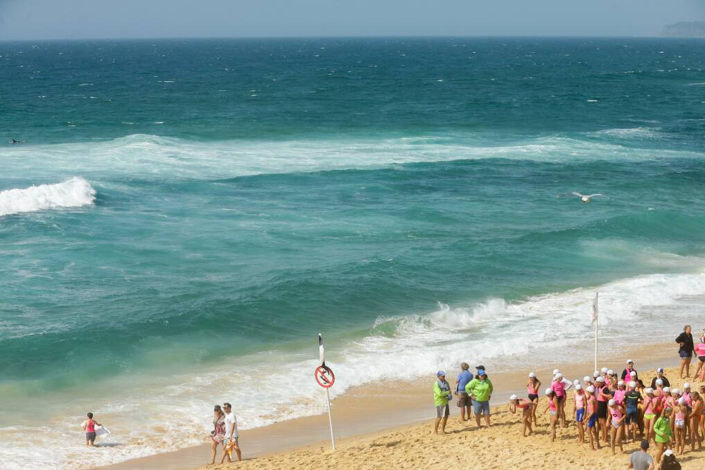 CLEARED: Nippers out of the water at Bar Beach following a shark sighting in January. Picture: Jonathan Carroll