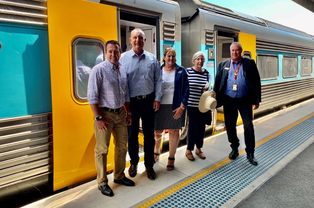 SET TO GO: Paul Toole, Michael Johnsen, Sue Moore, Two More Trains for Singleton's Anne Boyd and NSW TrainLink's Robert Blanch on Thursday. 