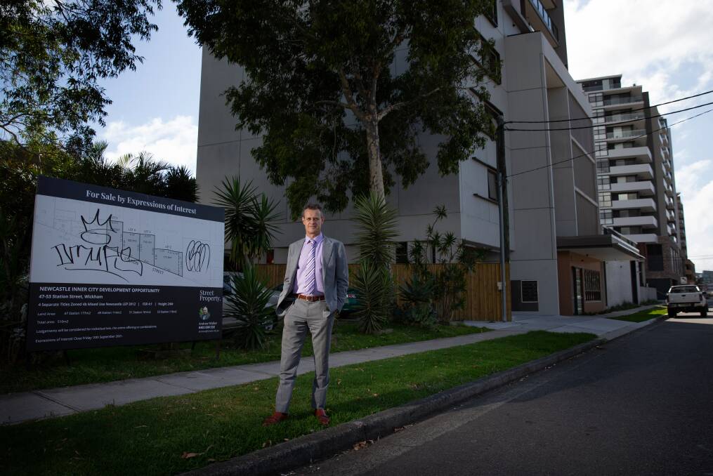 'LOST OPPORTUNITY': Tim Crakanthorp outside the lots that were for sale. He said the adjacent unit block, shown in the background, is an example of the type of social housing which could have been built. Picture: Marina Neil
