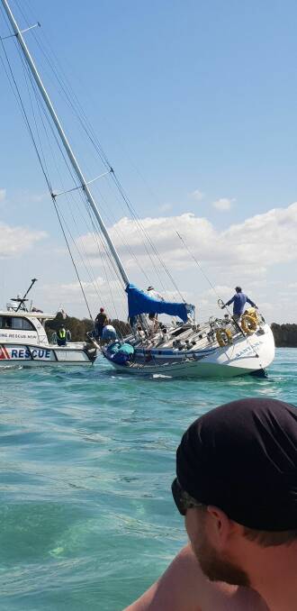HELP REQUIRED: The vessel Peter Watkins and his crew sailed out of Lake Macquarie last week. It is one of the many vessels that has required assistance in recent weeks due the shallow depth of Swansea Channel. Picture: Supplied