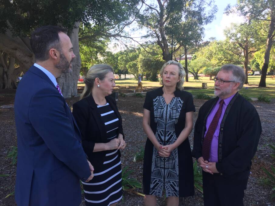 ACT NOW: Brad Webb, Louise Pratt, Sharon Claydon and Graham Smith talk about payday loans on Monday at Civic Park, where they made a collective call for legislation. 