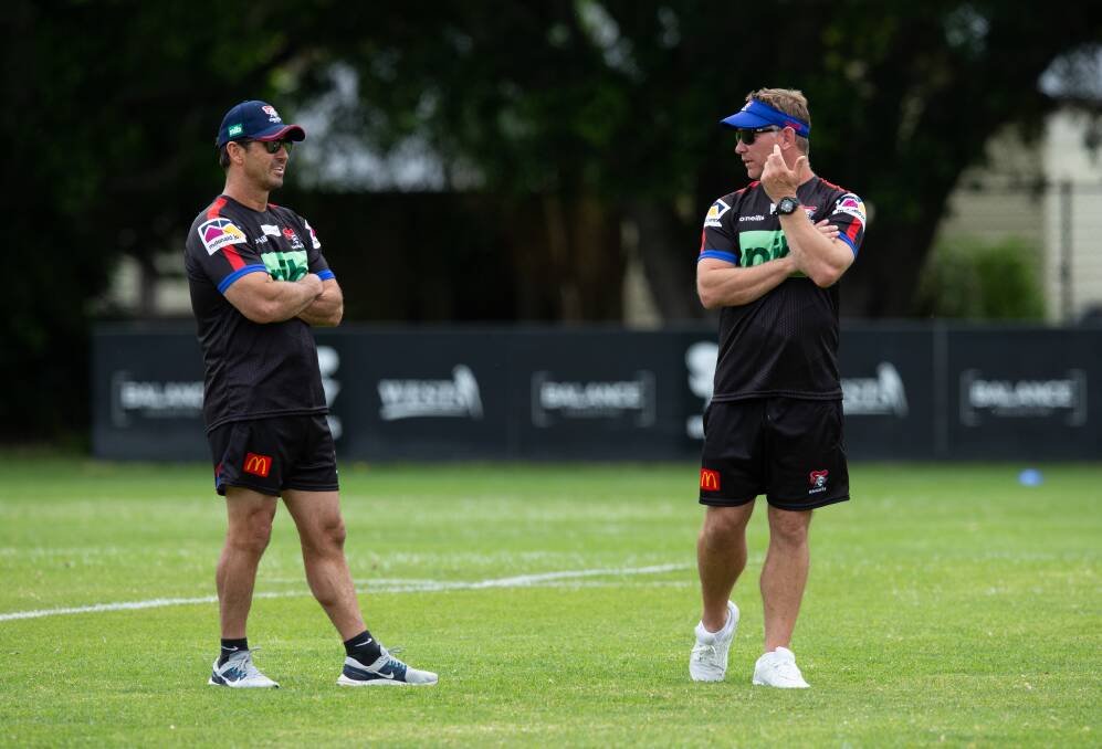 Knights legend Andrew Johns with head coach Adam O'Brien. Picture by Marina Neil