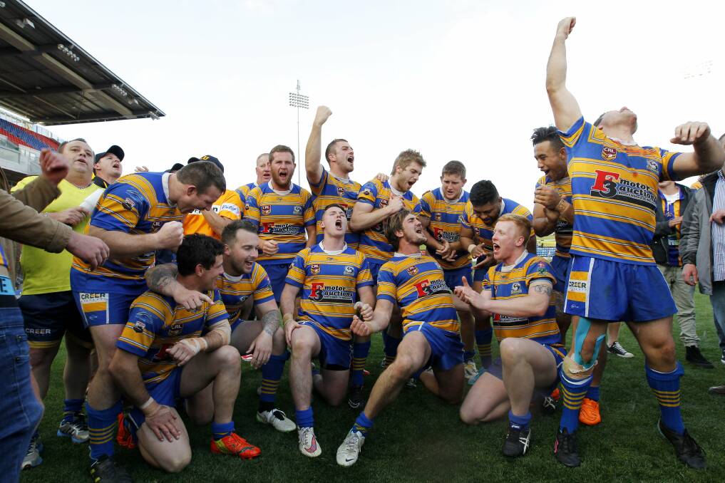 PREMIERS: The 2015 side celebrates winning the grand final. Picture: Max Mason-Hubers