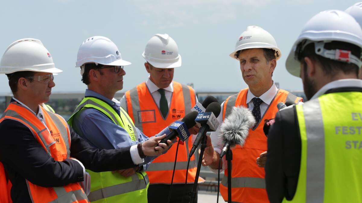 PREDICTION: Andrew Constance announcing Keolis Downer as the operator of the city's transport network in 2016. Picture: Simone De Paek