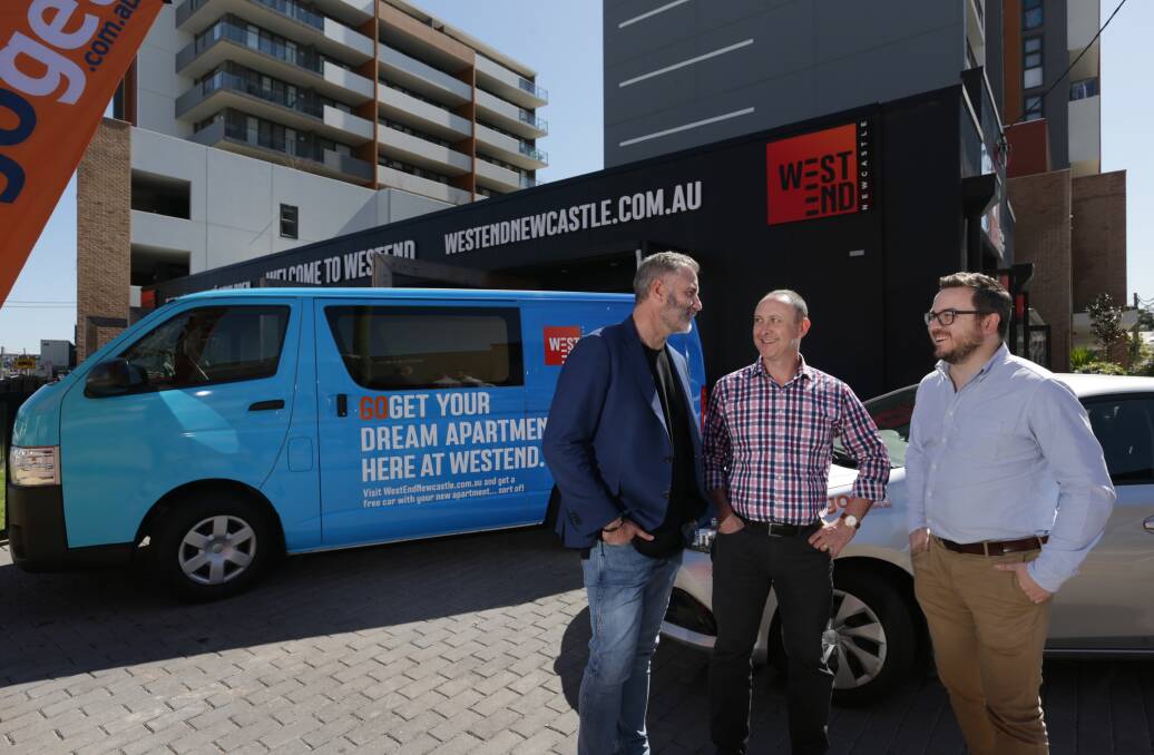 FURTHER INVESTMENT: Luke Berry with apartment owner Les Parry and GoGet's Josh Brydges earlier this month. Picture: Simone De Peak