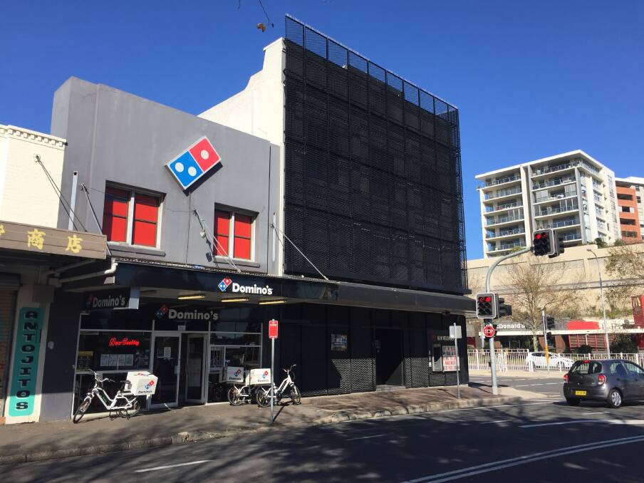 APPROVED: The nightclub will expand into the Domino's building.