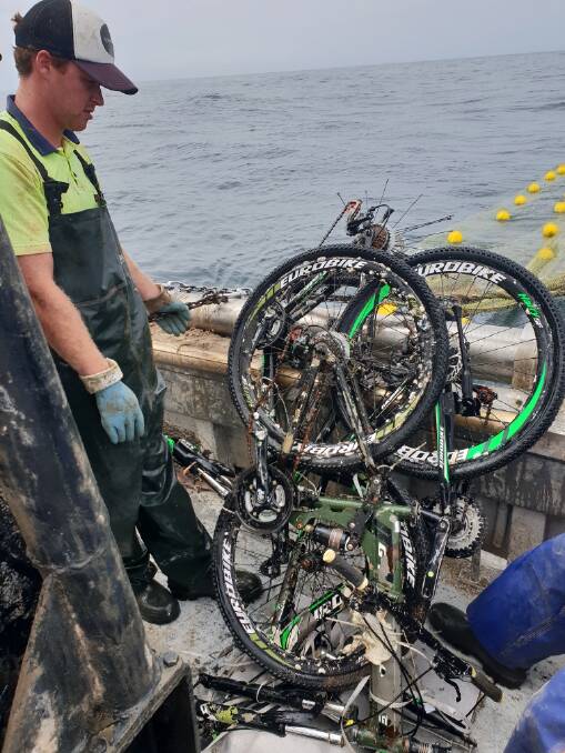 WHAT A CATCH: Bikes caught in Murray Ham's fishing net. 