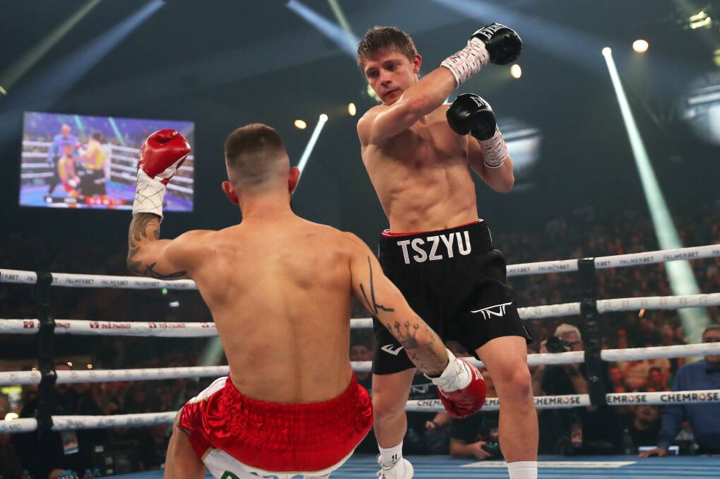 Nikita Tszyu knocking down Mason Smith at Newcastle Entertainment Centre in May. Picture by Peter Lorimer 