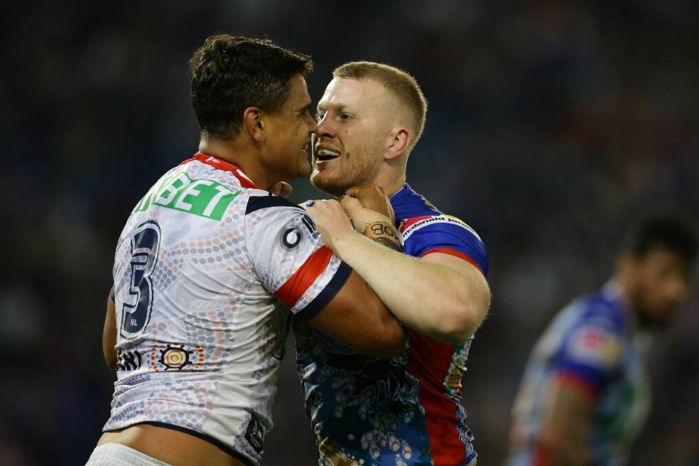 Mitch Barnett and Latrell Mitchell lock horns during a fiery contest in 2019. Picture: Jonathan Carroll 