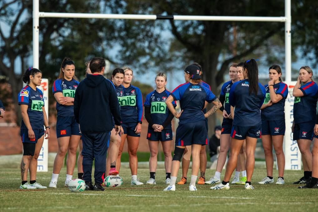 Newcastle Knights players gathered around coach Ronald Griffiths at training this week ahead of the NRLW grand final at Accor Stadium on Sunday. Picture by Marina Neil