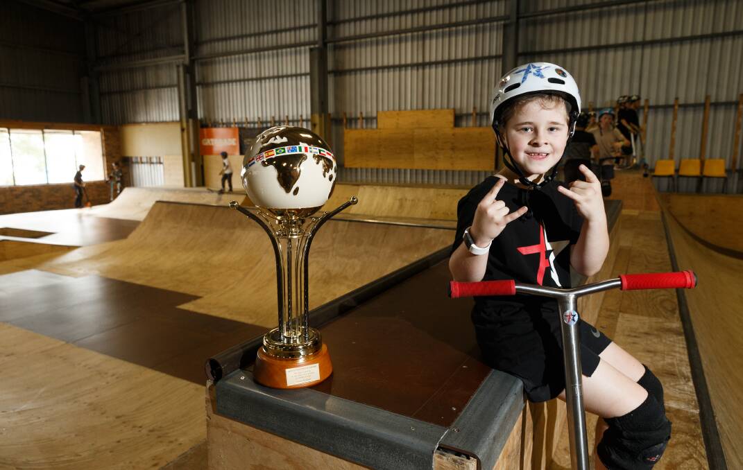 SETTING RECORDS: Jamie Russell holds a world record for being the youngest person to complete a back flip on a scooter to a wood ramp. He is pushing towards a national title in the 2018/19 Australian Scooter Assocation season. Pictures: Max Mason-Hubers