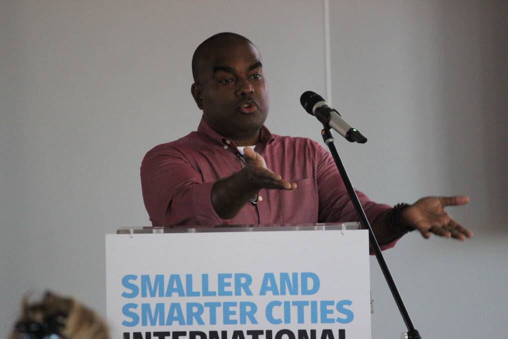 INVENTIVE: Nigel Jacob, co-founder of the Boston Mayor's Office of New Urban Mechanics, speaking at the Smaller and Smarter Cities International Symposium. 