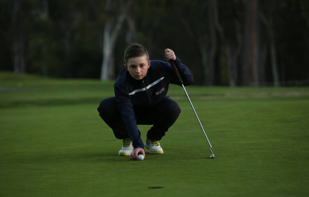ON TARGET: Harry Atkinson eyes a put. The 12-year-old hit the lowest individual scores at the SSA Primary Golf Championship but his team had to settle for a silver medal in the Craig Parry Shield. Picture: Simone De Peak