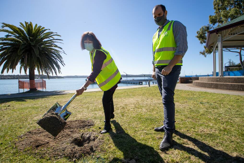 UNDERWAY: Lake Macquarie mayor Kay Fraser and community assets manager Brendan Callander mark the start of construction at the foreshore on Wednesday. 