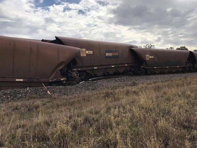 OFF THE RAILS: The derailed coal train near Muswellbrook on Wednesday. 
