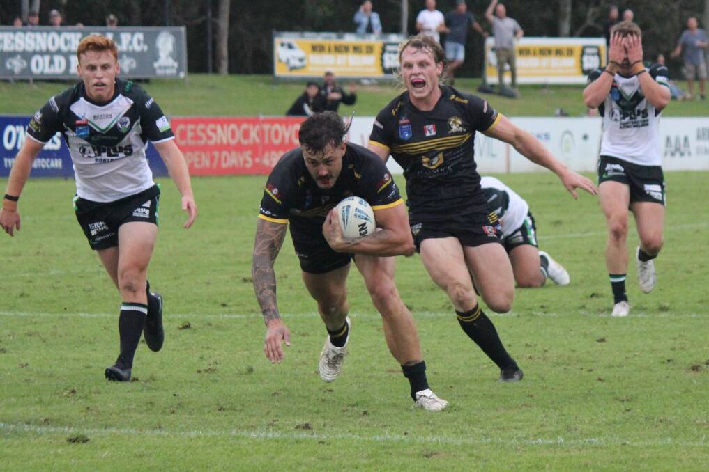 Luke Huth watches Cessnock teammate Brayden Musgrove cross for a try against Maitland. Picture by Fee Ambrum-Wallace/Cessnock Goannas Facebook