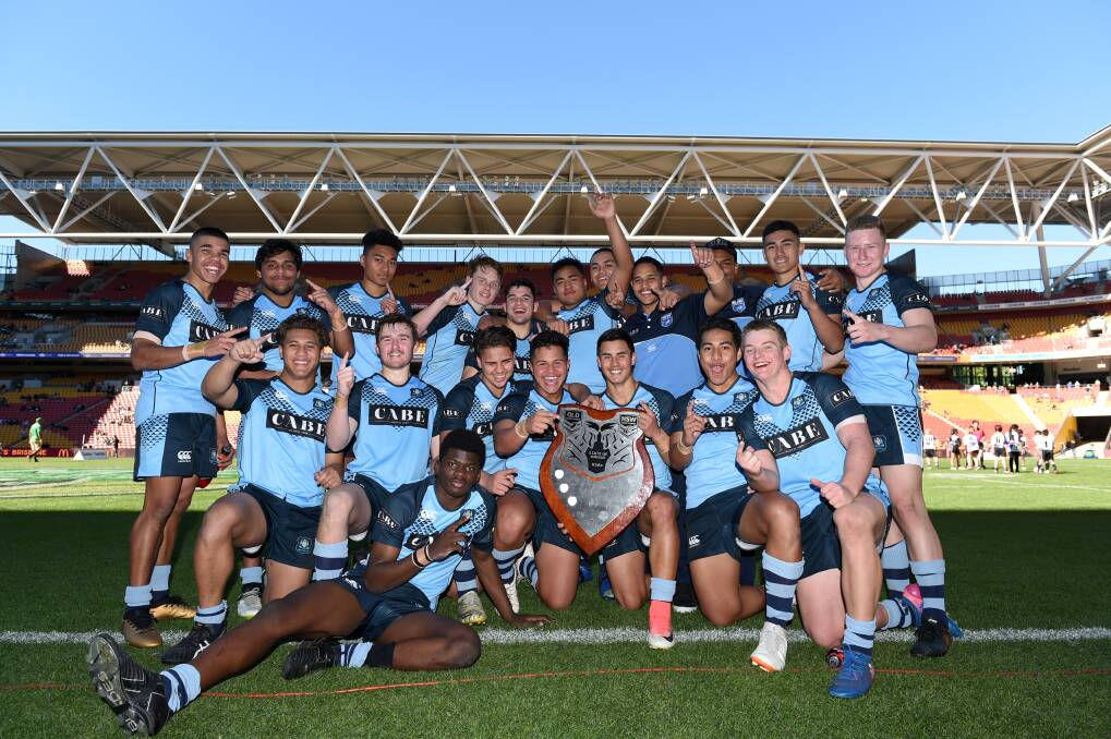 WINNERS: The NSW under-16 representative rugby league side after their Origin win against Queensland at Suncorp Stadium. 