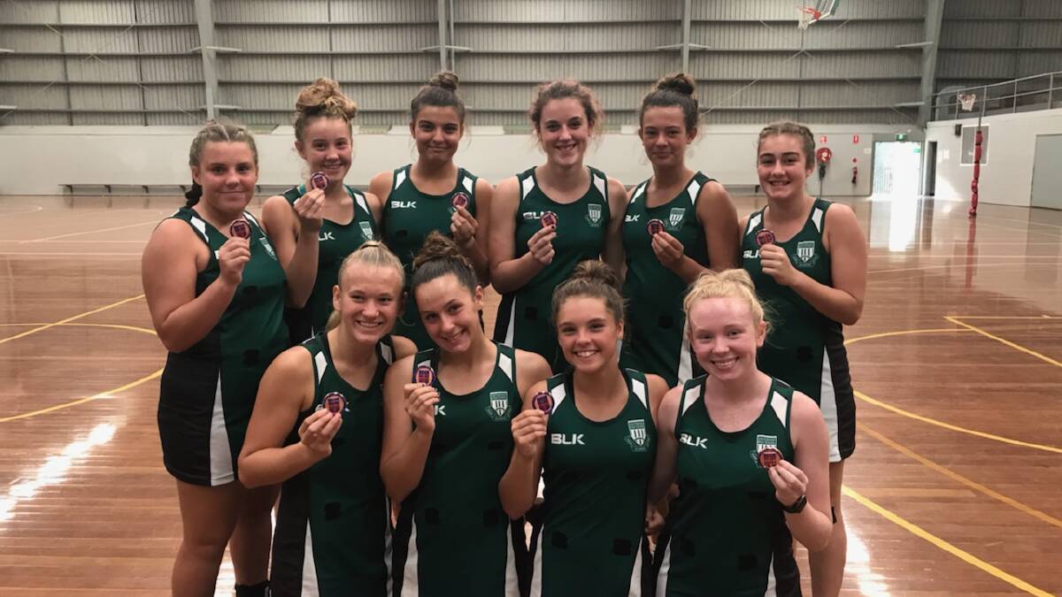 CHUFFED: Whitebridge High School girls netball side after finishing third at the state finals last week. Picture: Supplied. 