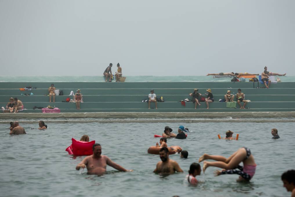 UNIQUE FEATURE: The layer of sand at the bottom of the Newcastle Ocean Baths pool is valued for wading. Picture: Jonathan Carroll