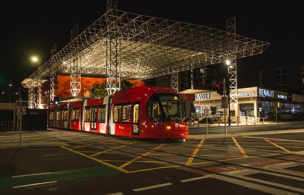 NIGHT RIDER: A tram leaves Newcastle Interchange. Picture: Marina Neil