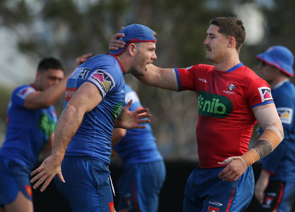 Dylan Lucas, right, training with outgoing Knights teammate Lachlan Fitzgibbon. Picture by Simone De Peak
