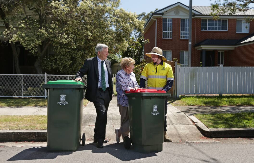 SUSTAINABILITY: Christopher Woodthorpe, Hamilton South resident Jean Campbell and Josh Wilks, a bin positioner with Newcastle City Council. Picture: SImone De Peak