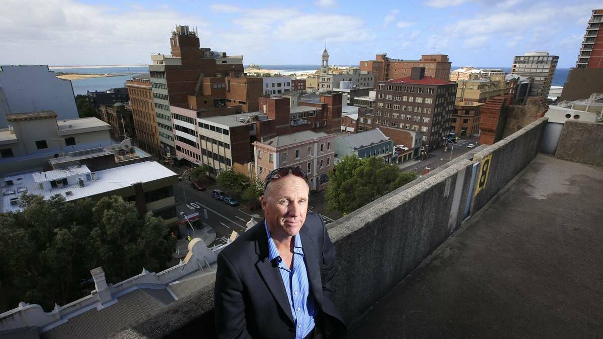 HOLDING PATTERN: Darren Nicholson in 2012 atop his Bolton Street car park, which he says he might knock down if council replaces the 380 mall car park spaces. 