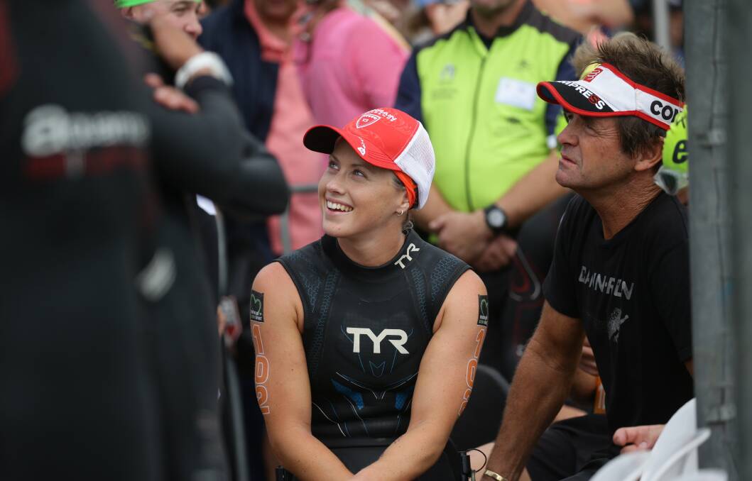 ALL SMILES: Lauren Parker at the Sparke Helmore triathlon in Newcastle. Picture: Jonathan Carroll 
