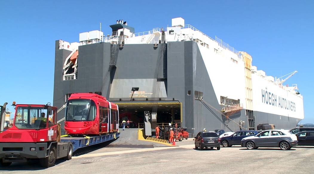 JOURNEY: The first of Newcastle's light rail vehicles being loaded onto the ship in Spain. 