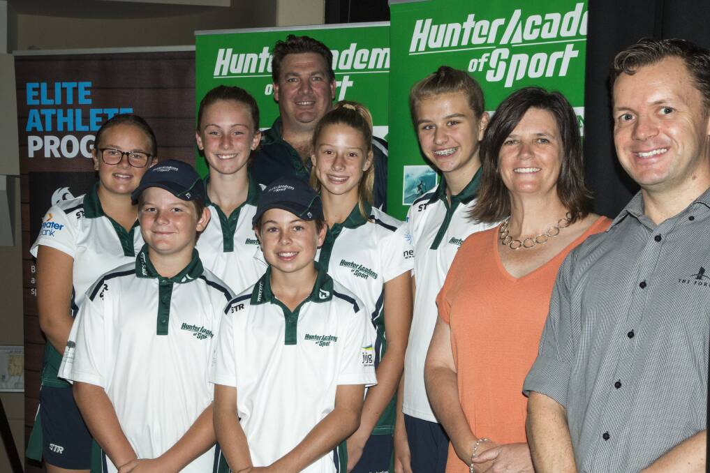 DEAL: NuSport campus programs manager Andrew Yapp, UON's Tracey Chalk, CEO Hunter Academy of sport CEO Brett O’Farrell and HAS athletes. 