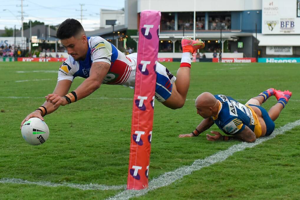 ONE OF HIS BEST: Knights winger Enari Tuala scores in the corner against Parramatta in week one of the NRL finals last year at Browne Park in Rockhampton. Picture: Getty Images 