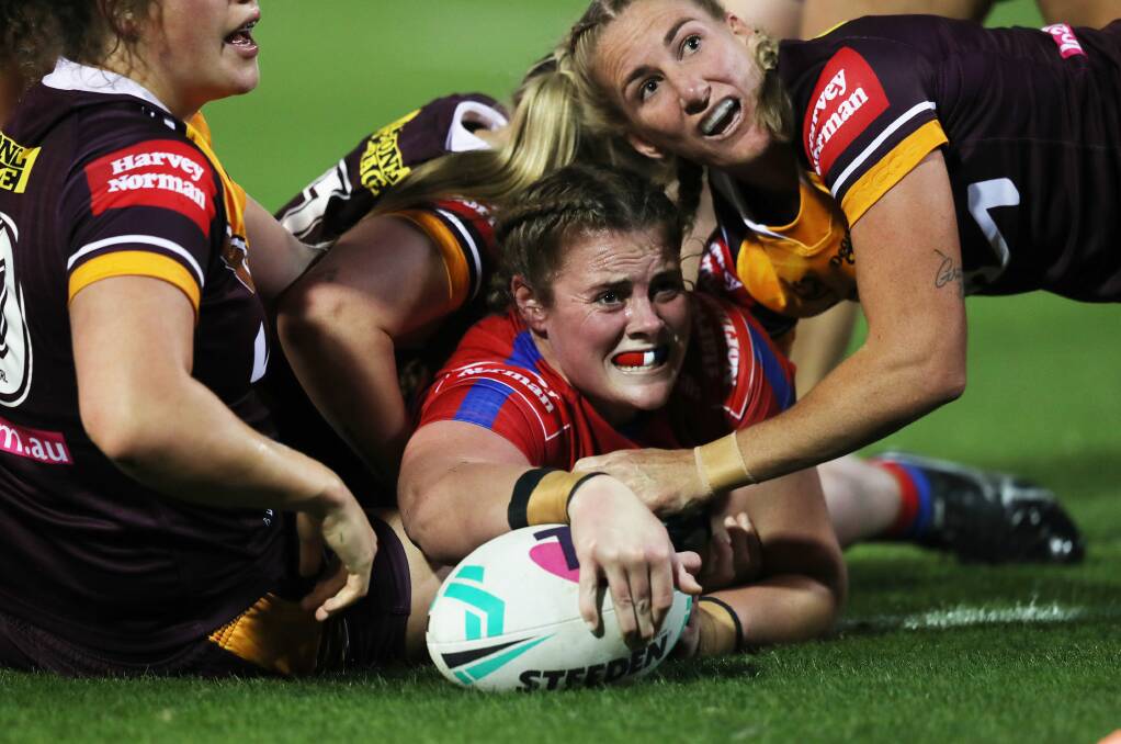 TRY TIME: Knights forward Tayla Predebon crosses for her first NRLW try in Newcastle's 32-14 win over Brisbane on Sunday. Picture: Peter Lorimer 