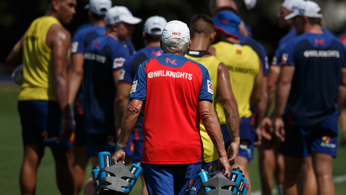 GOT YOUR BACK: John Thomas, left, plays a crucial role in every Newcastle training session and on game day. Above: "JT" and head trainer Jamie Williams discuss their next task. Pictures: Max Mason-Hubers
