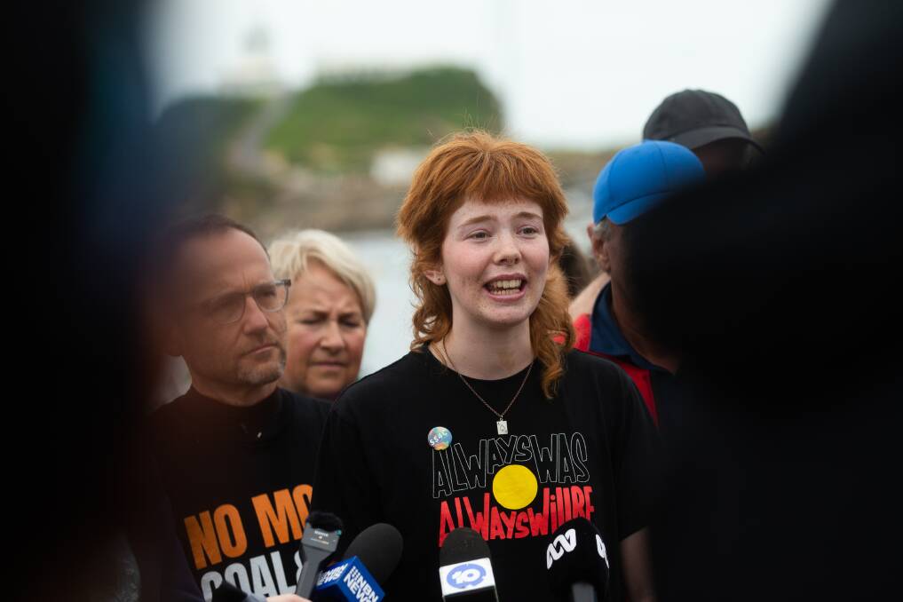 Niamh Cush, 15, speaks at the Rising Tide blockade of Newcastle harbour on Saturday, November 25.