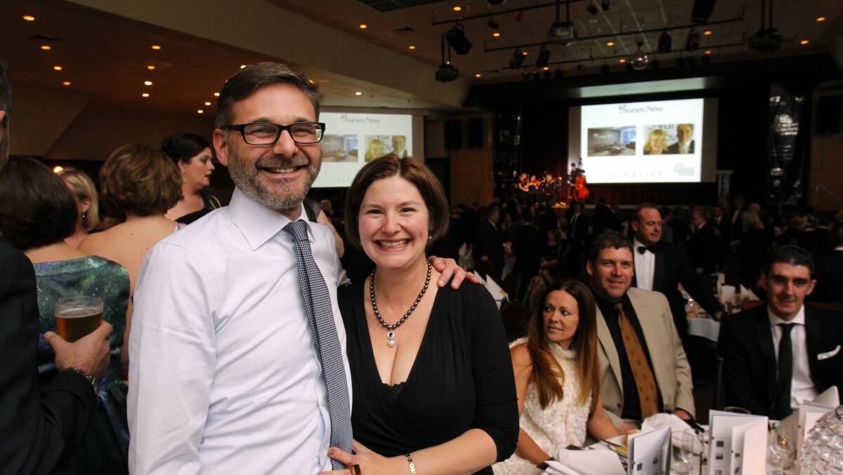 Tech pioneer Chris Deere sadly died on September 7. He is pictured here with his partner Penny Reeves in 2013 at the Hunter Business Awards, where he was recognised as the Business Leader of the Year. Picture by Max Mason-Hubers