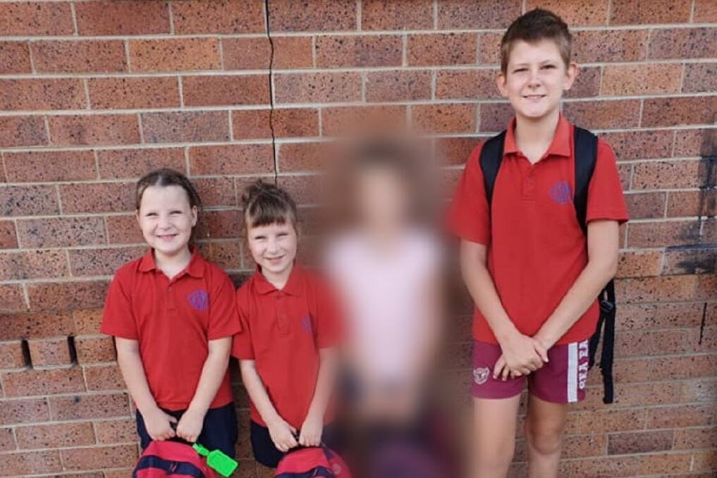 TRAGEDY: Chris and Kara Atkin's family home was devastated by fire, claiming the lives of three of their children, twins Matylda and Scarlett and brother Blake. Bayley (pictured in pink shirt) survived the blaze. 