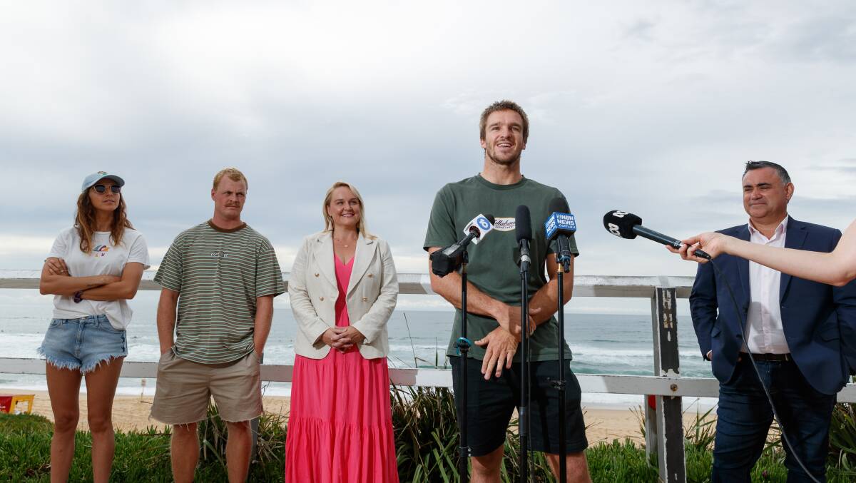 Local surfer Ryan Callinan pictured with (from left) local surf star Philippa Anderson, Jackson Baker, mayor Nuatali Nelmes, and John Barilaro. Picture: Max Mason-Hubers