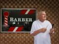Danny Everingham will have been in his Mitchell Street barbershop for 45 years in February. Picture by Simone De Peak