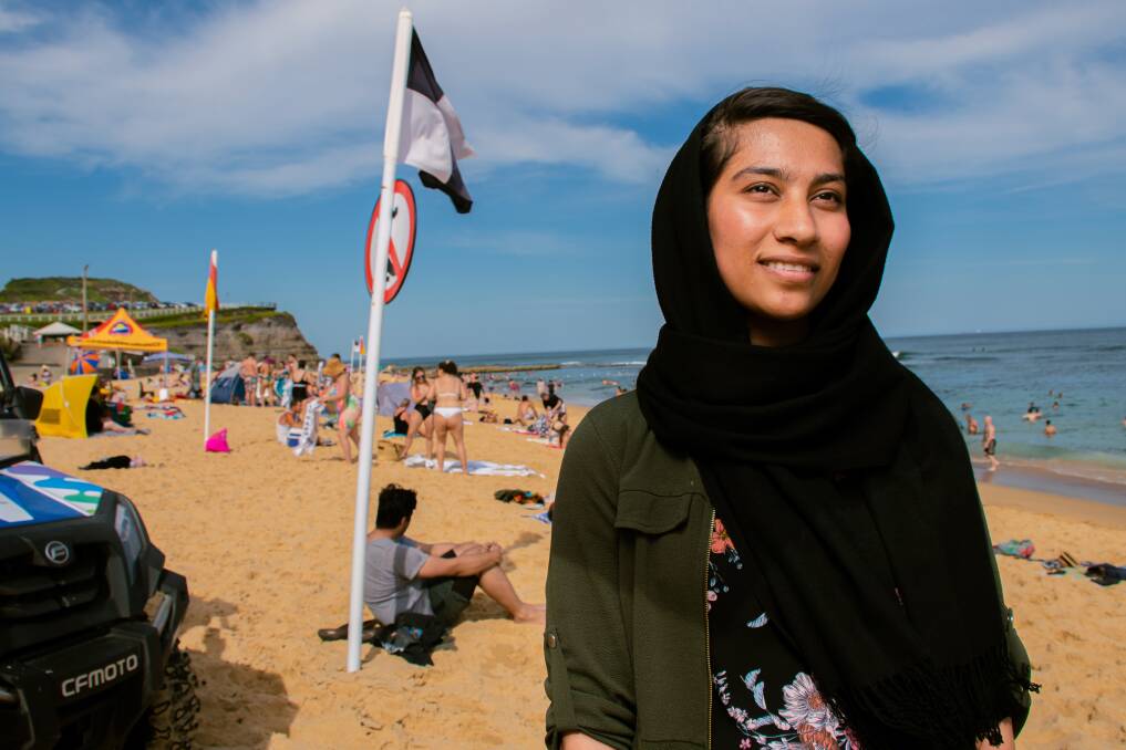Khadiija Ahmadi learned to swim with the "Welcome to the Beach" program, after her family emigrated to Australia from Afghanistan in 2014. She has attended the program each of the past five years. Picture: Simon McCarthy