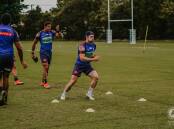 BEST FOOT FORWARD: Adam Clune, who played 10 games for the Dragons last season, at training in the Red and Blue 