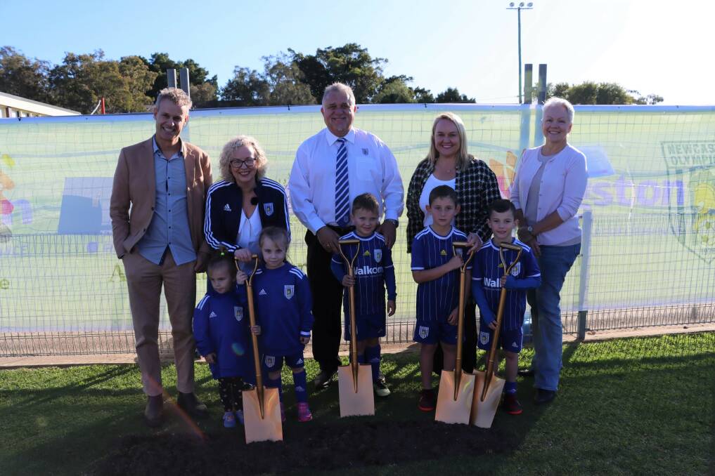 State and federal MPs Tim Crakanthorp and Sharon Claydon, Newcastle Olympic FC President George Sofianos, Lord Mayor Nuatali Nelmes, Councillor Carol Duncan and local junior Newcastle Olympic FC supporters at the sod turning on Saturday, June 17.