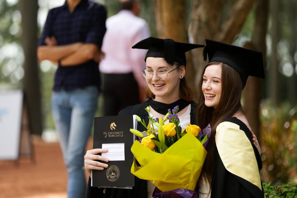Aleesha Pyne and Ruby Pippen at the University of Newcastle graduation ceremony for Engineering, Computer Science, Data, and IT. The Graet Hall, Callaghan. Picture: Jonathan Carroll