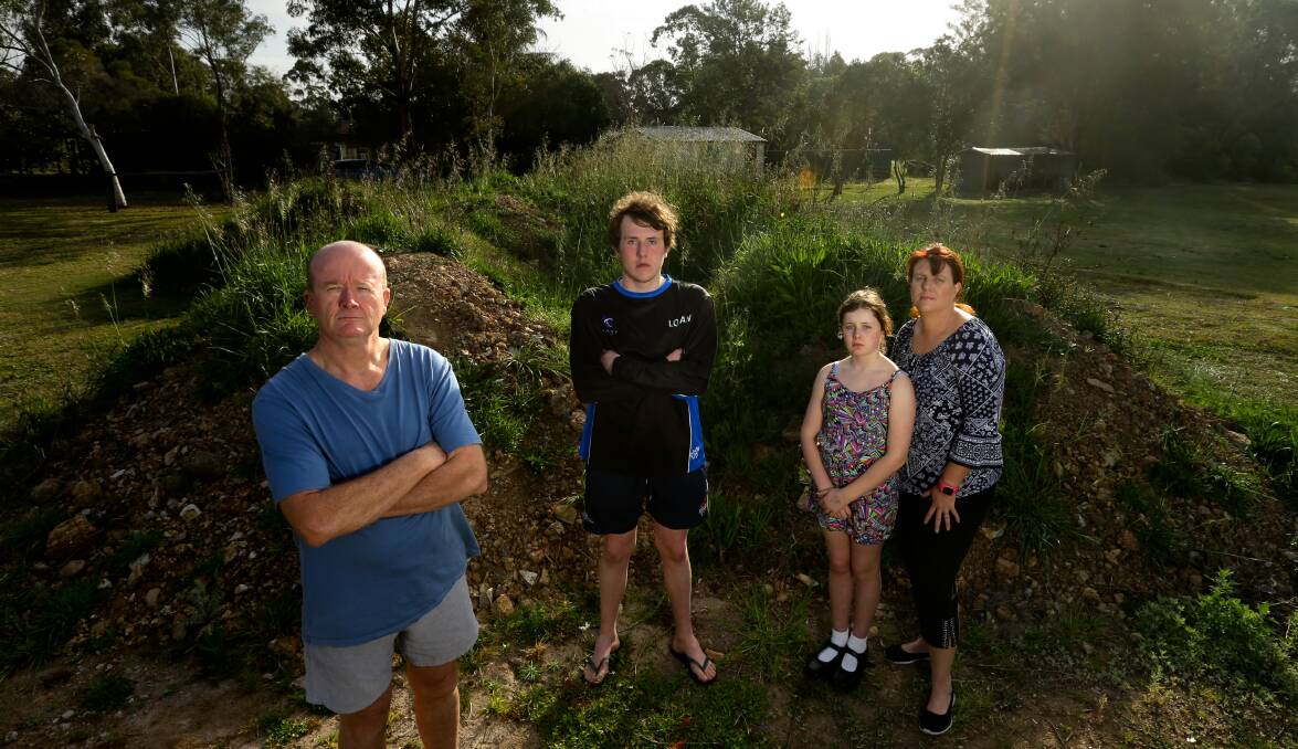 Lochinvar woman Bernie Heald, who gave evidence to the Financial Services Royal Commission, pictured with her husband Bruce and children Logan and Aleena in September. Picture: Jonathan Carroll