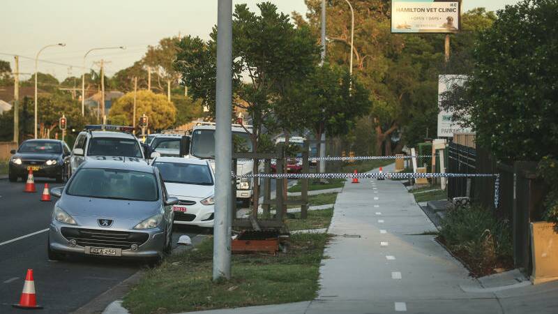 INVESTIGATION: Police examining the scene of the alleged kidnapping in Donald Street, Hamilton in March this year. Alleged kidnapper Valentino Taufaao died after being stabbed at a unit at Hamilton South. 