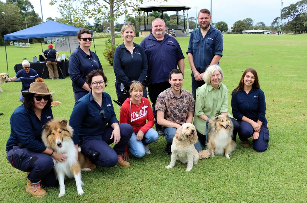 Councillor Katrina Wark, Deputy Lord Mayor Declan Clausen and Councillor Margaret Wood with City of Newcastle Rangers at the Pups in the Park event at Lambton Park.