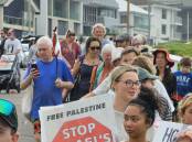 A procession of around 50 people staged a "sombre" protest on Good Friday along Memorial Drive toward Bar Beach in solidarity with Christian Palestinians and Muslims nearing the end of Ramadan in Gaza