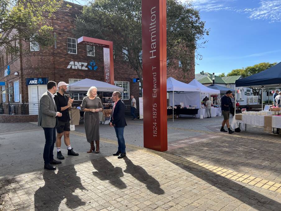 Deputy Mayor Declan Clausen, Hamilton BIA chair Reece Hignall, Councillor Carol Duncan and Hamilton providore market organiser Kerry Dowling at the recently-complete James Street Plaza beautification on Beaumont Street Saturday. Picture: Simon McCarthy 