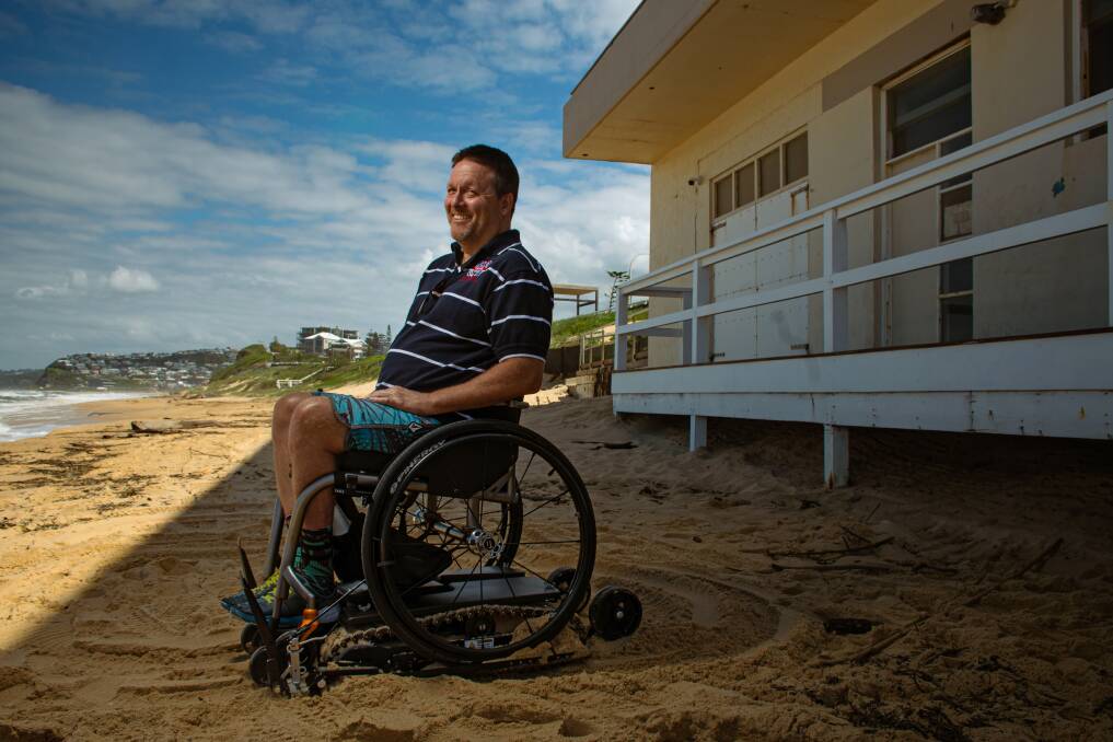 RAPT: Gus McConnell is on top of the world after the club invested in three track devices to help wheelchair users access the city's beaches. Picture: Simon McCarthy
