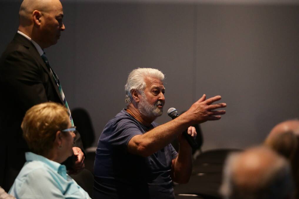 Brian Byers of Williamtown challenges the speakers with questions during the presentation. Photo: Jonathan Carroll